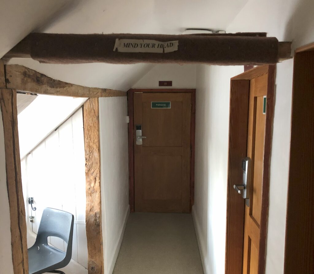 Cabot Hall with Mind Your Head sign