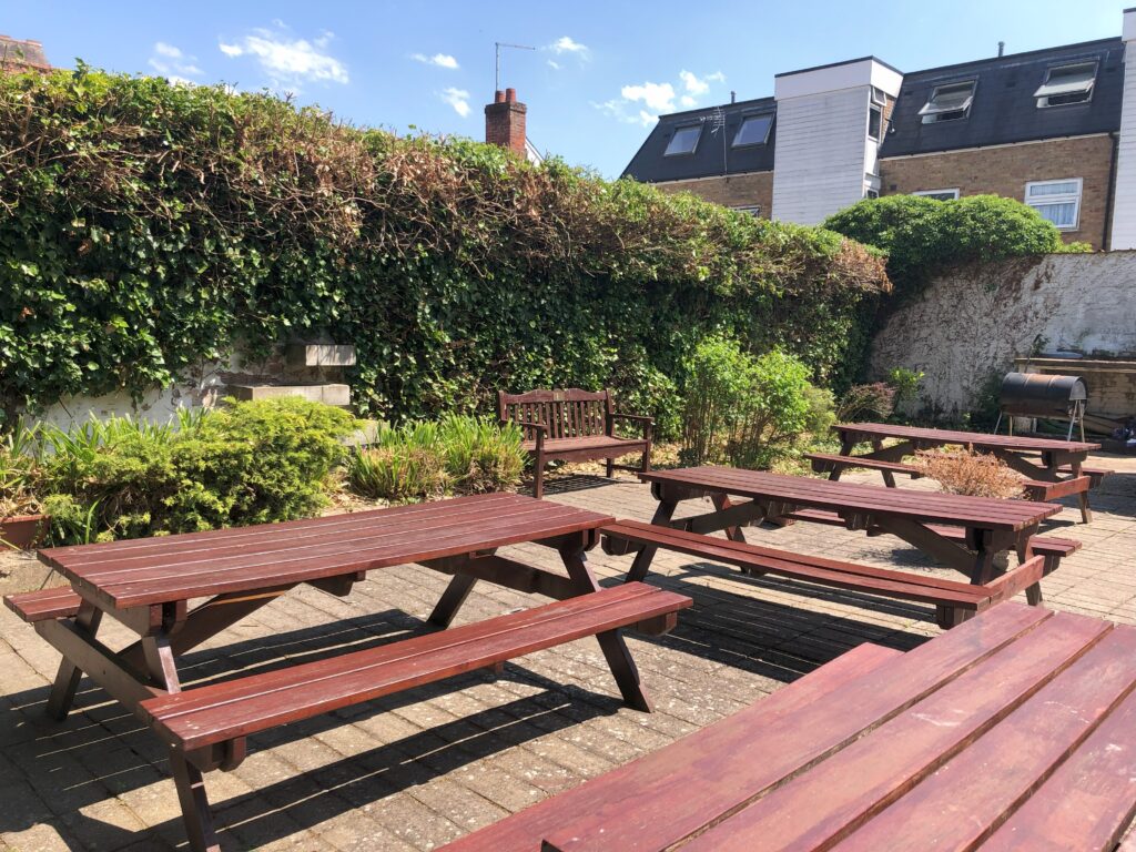 Picnic Tables outside St. Johns House